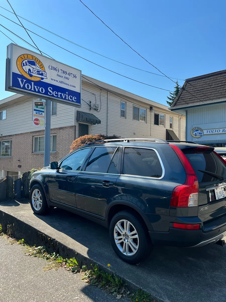 A Volvo XC90 under the All Vovo sign